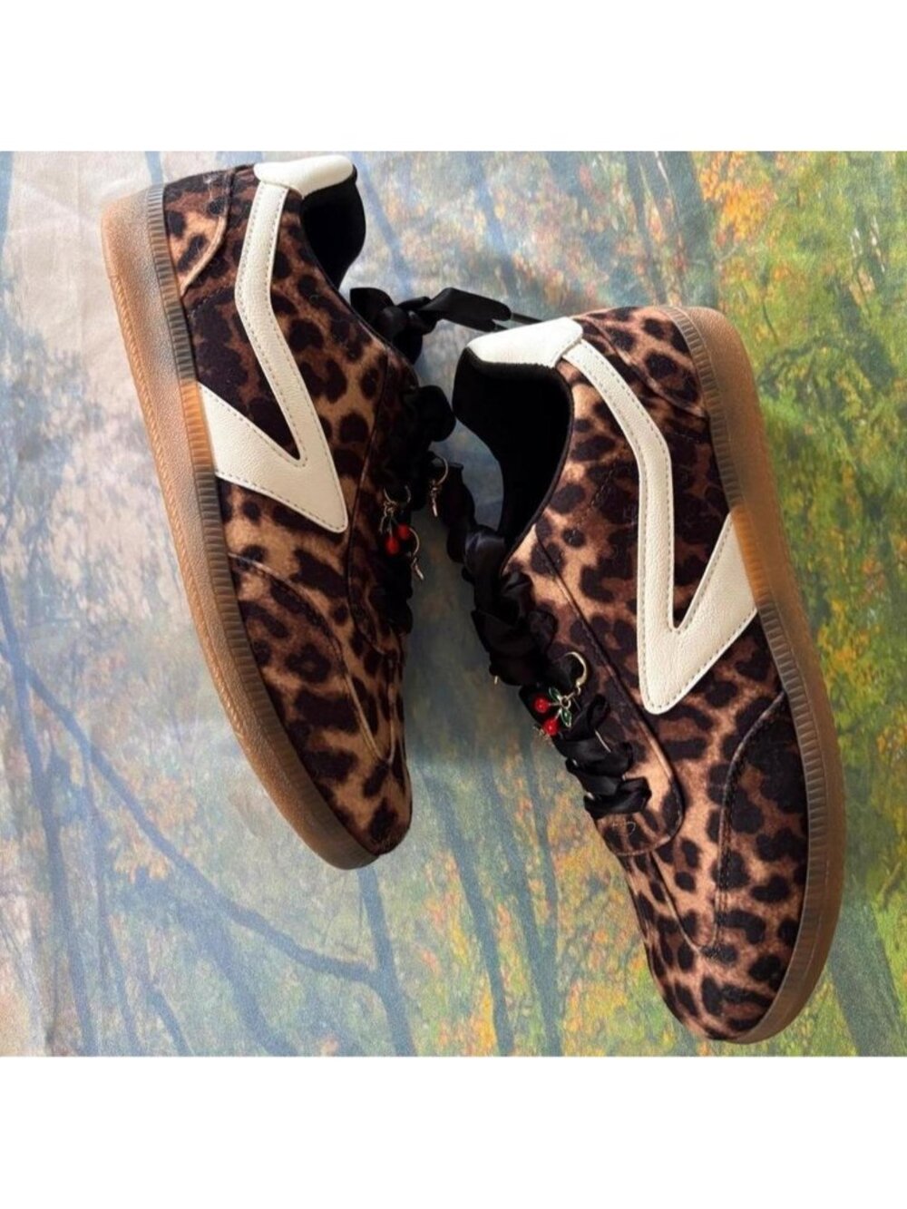 Dolce Vita leopard print sneakers with charms